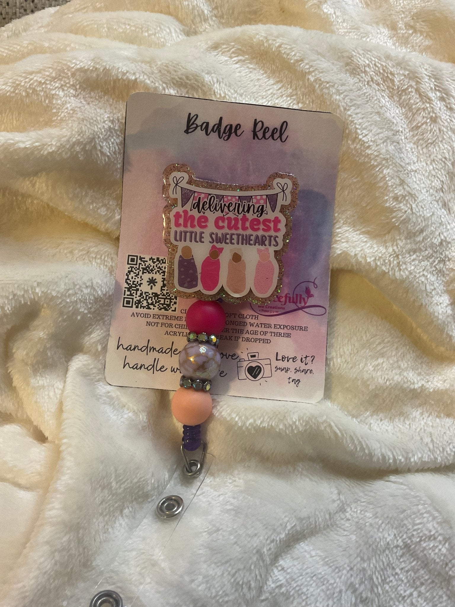 Delivering Cuties Nurse Badge Reel: Handmade Mississippi maternity gift by Gracefully Me Creations. Retractable beaded badge reel.