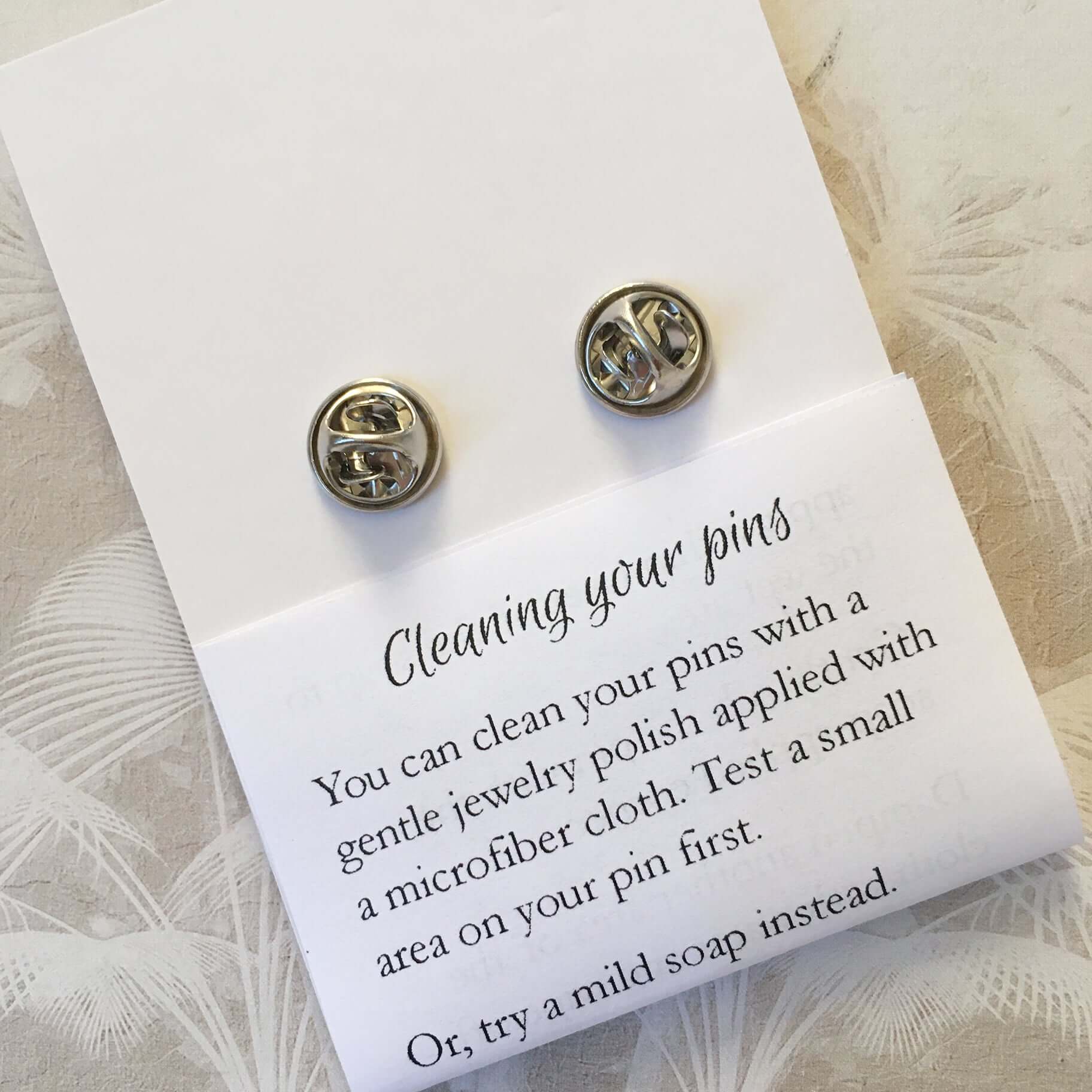 Enamel Pin Care Instructions: Cleaning Your Pins - Jewelry Cleaning Tips
