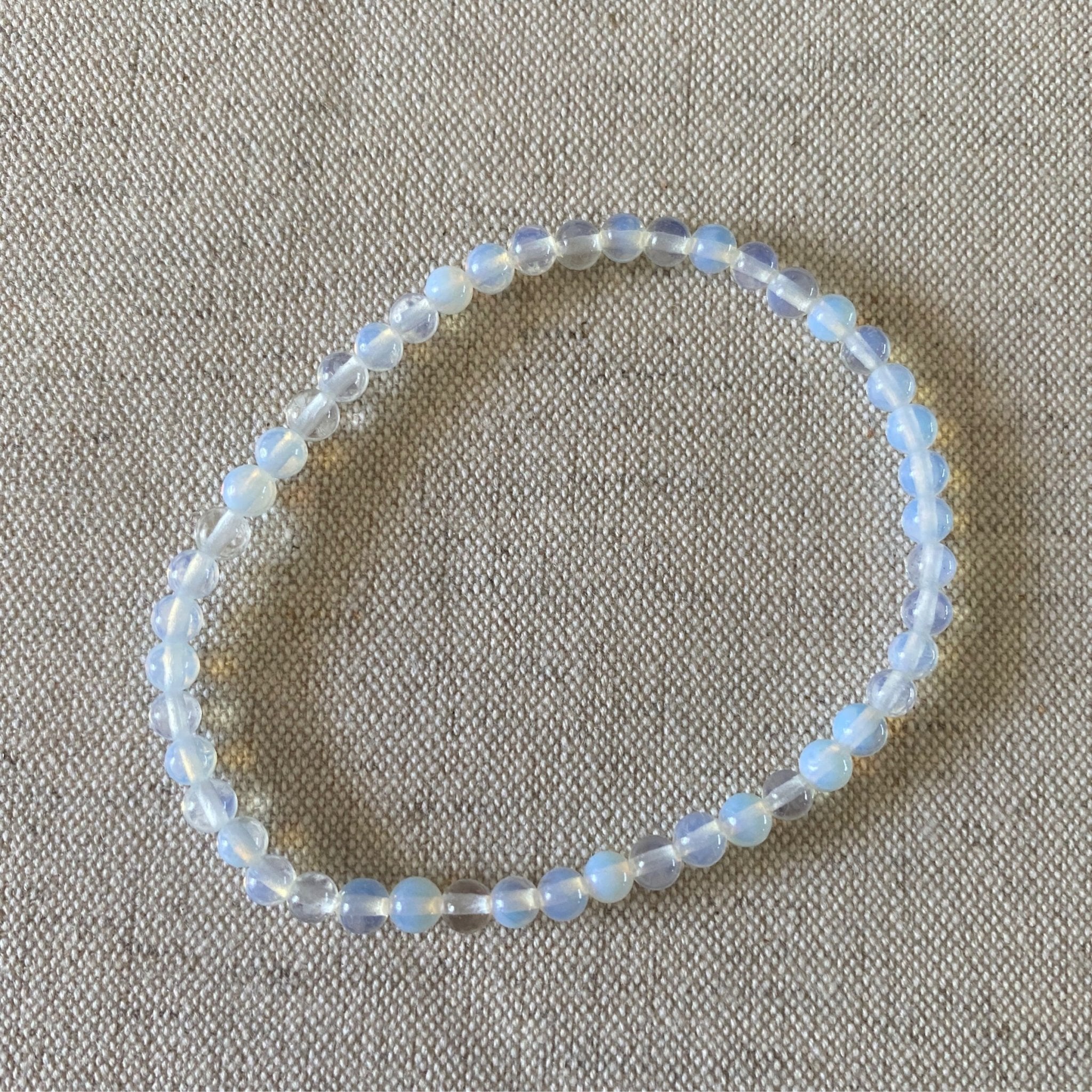 Handmade Opalite bracelet with 4mm glowing gemstone beads from Hands of Earth Energy