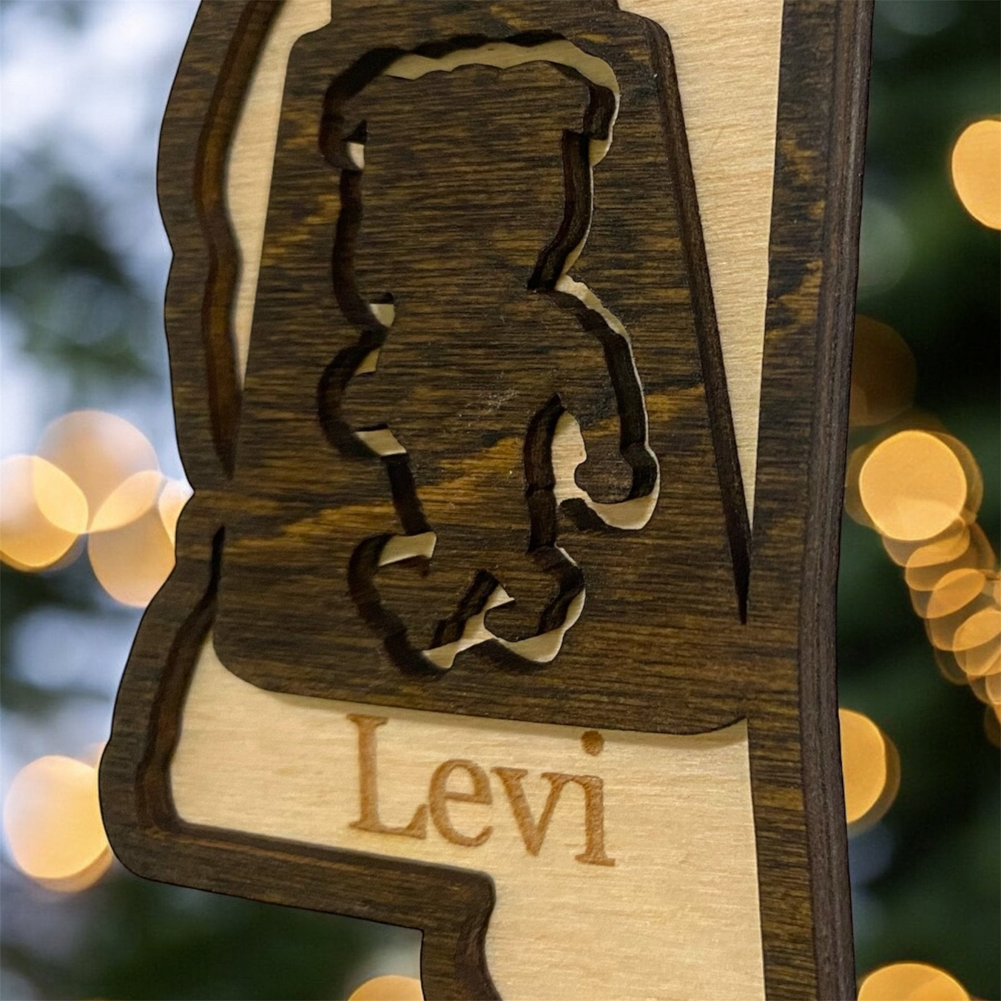 Mississippi Bulldog Cowbell Ornament: Personalized Wooden Keepsake by Main Street Collective, featuring 'Levi' name.