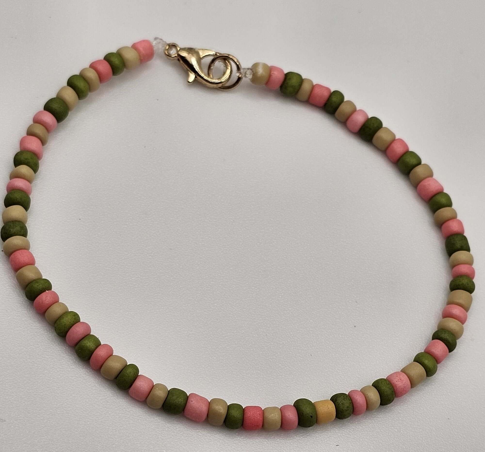 Full view of Pink & Green Tiny Bead Bracelet by The Tween Space – Mississippi handmade gift