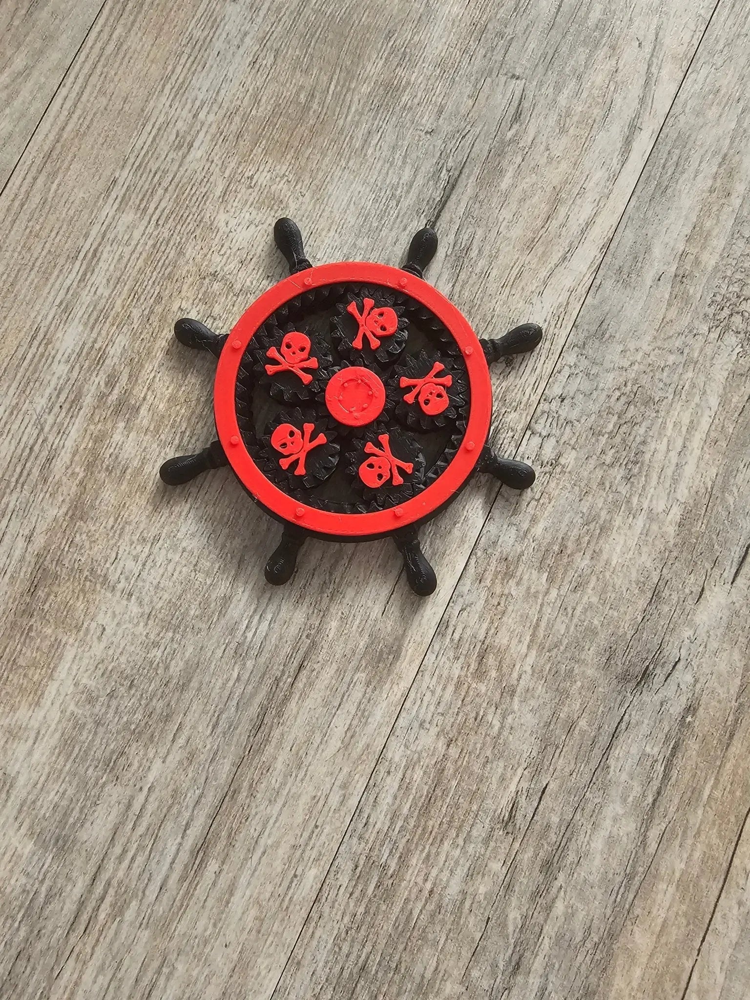 Pirate Ship Wheel Fidget Spinner: Skull & Crossbones Sensory Toy for Stress Relief. Red & Black Main Street Collective