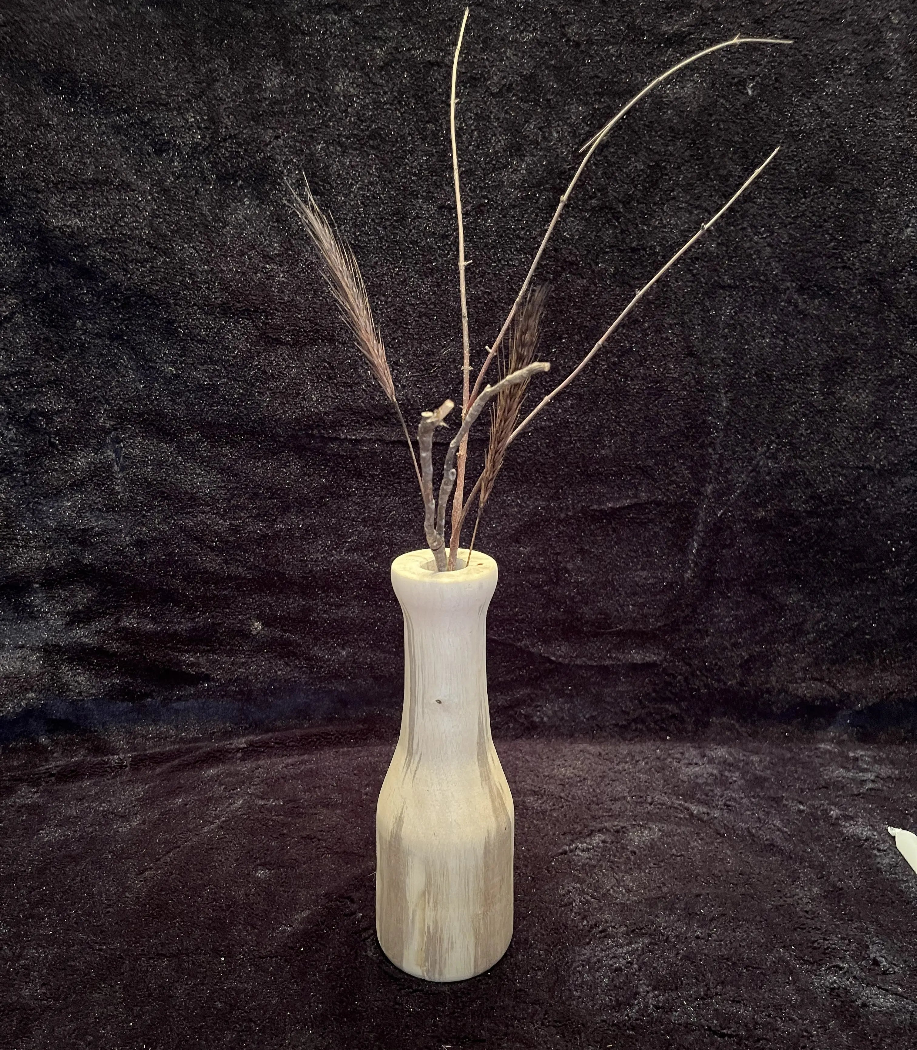 Rustic wooden vase candle holder with twigs. Tallow tree, white and grey wood grain design.