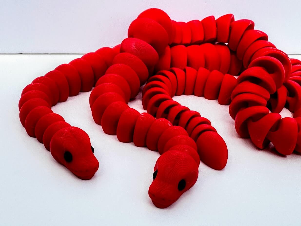 Red 3D Printed Snake Fidget Toy - Articulated Sensory Toy by Mushroom Lady Co.