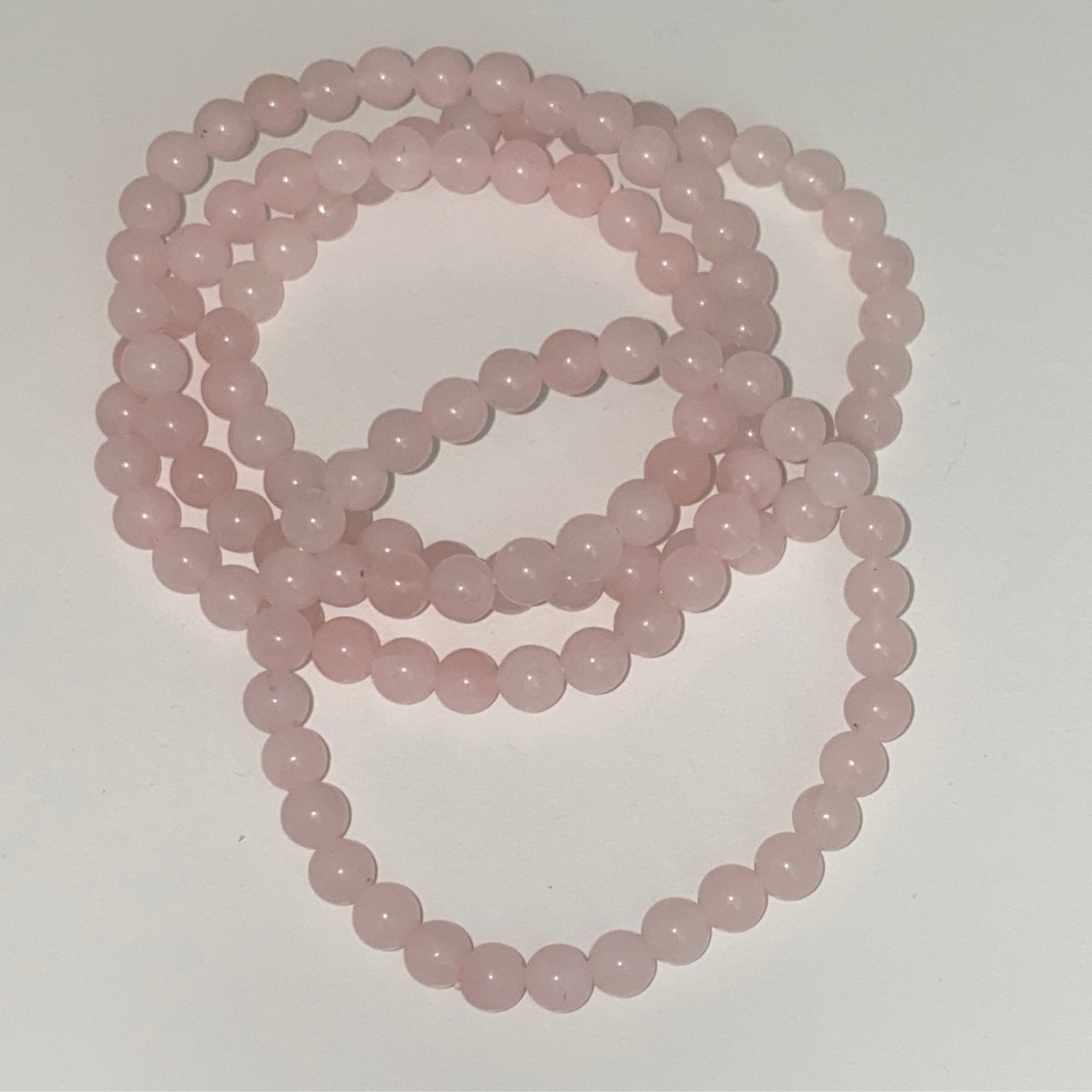 Handmade Rose Quartz bracelet with 6mm natural gemstone beads from Hands of Earth Energy

