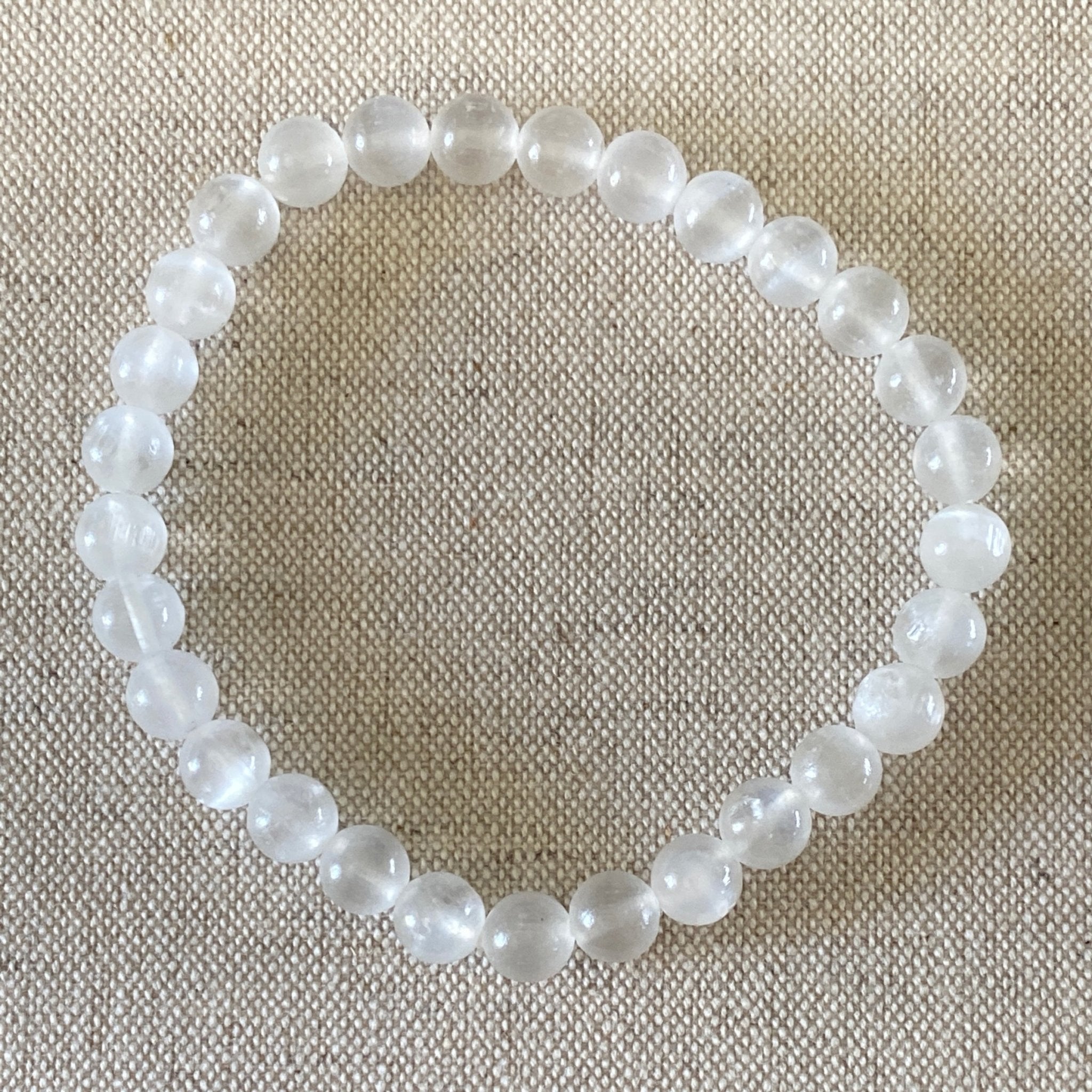 Handmade Selenite bracelet with 6mm white gemstone beads from Hands of Earth Energy