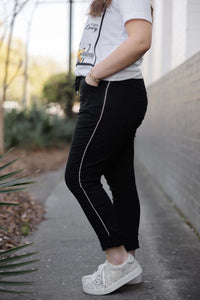 Boutique sparkle outfit – Rhinestone Magic Pants styled by Keep It Trendy with top and heels. View from Side