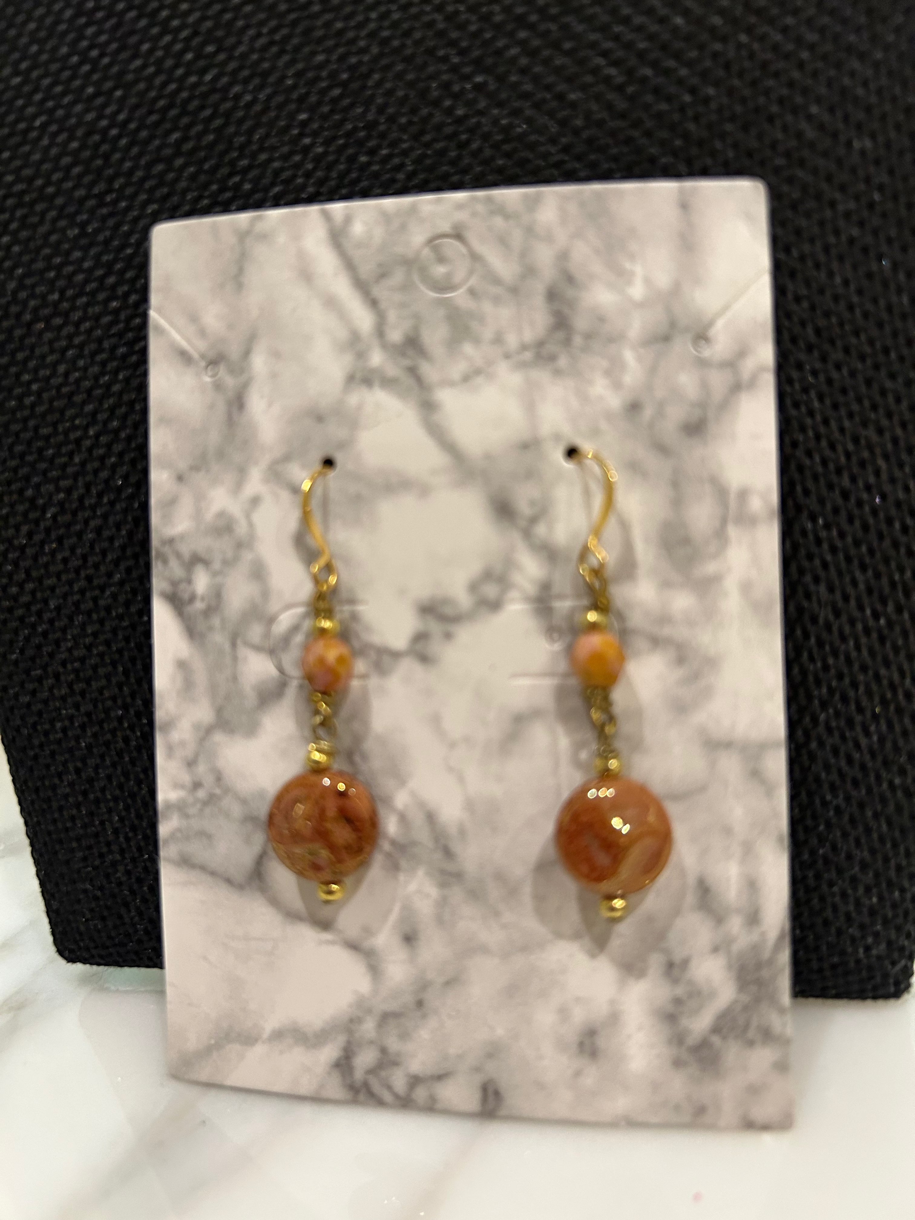Handmade earrings with sunstone beads and puffy 3D circle drops by Mushroom Lady Co.
