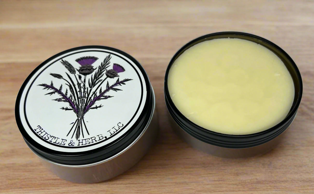 Solid Apple Bourbon lotion bar by Thistle and Herb, handcrafted in Mississippi with coconut oil and a citrus-apple-musk fragrance.