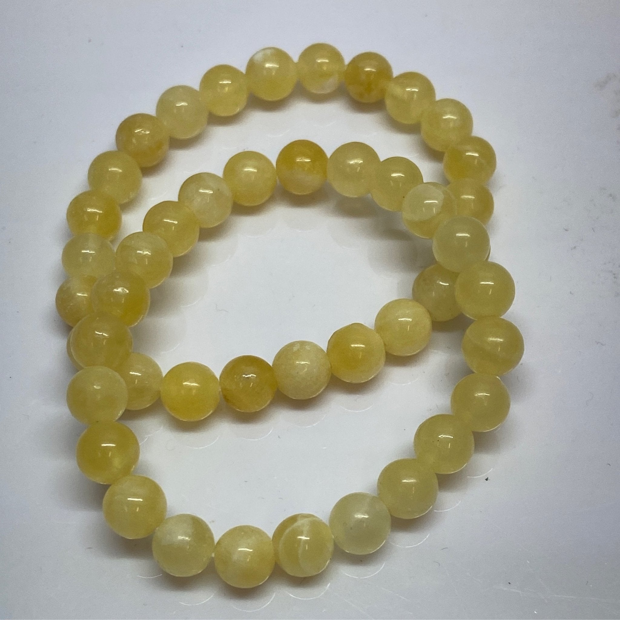 Handmade Yellow Calcite bracelet with 8mm natural gemstone beads from Hands of Earth Energy