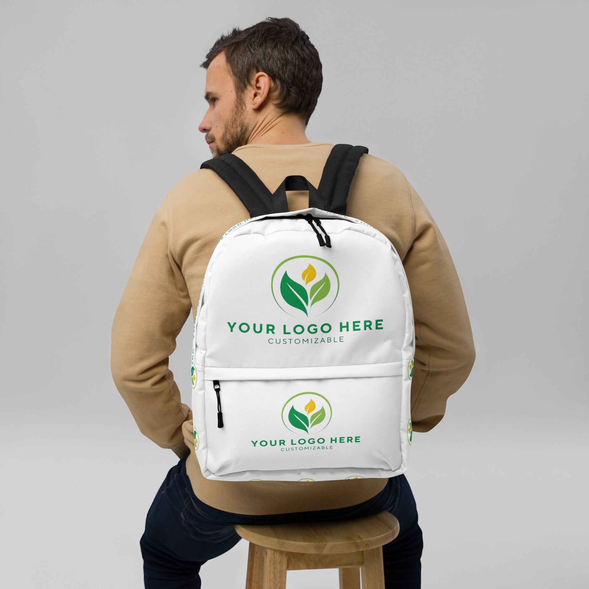 Man with Customizable Backpack with Logo - Branding by Main Street Collective