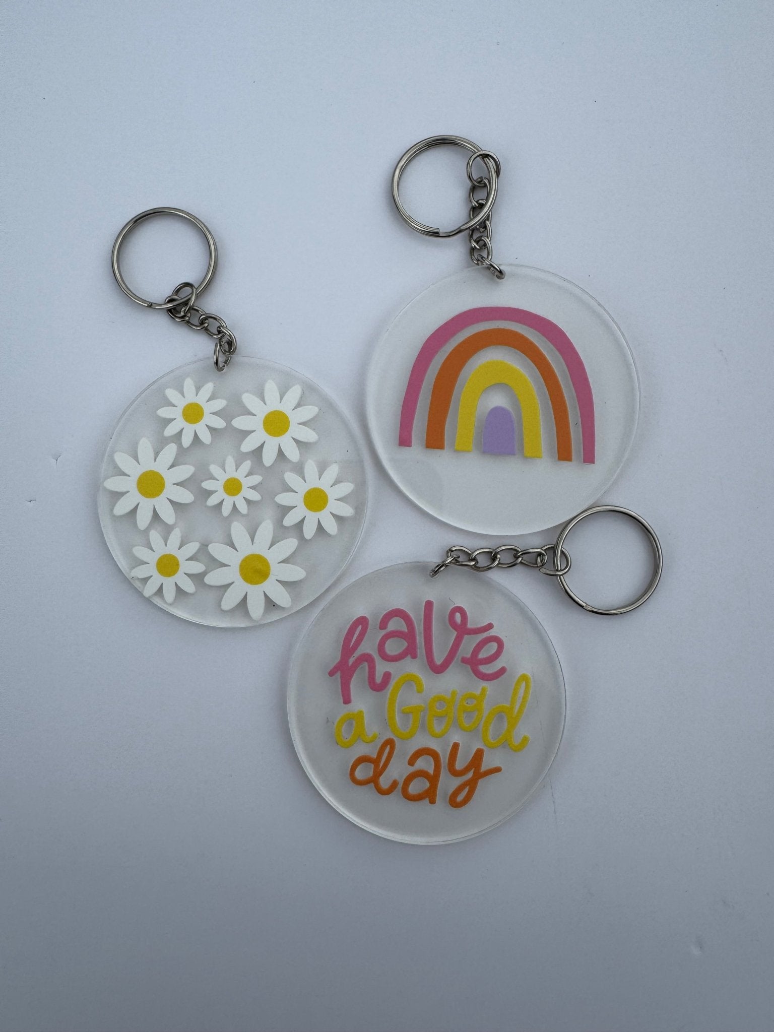Main Street Collective Keychains: Daisy, Rainbow, & "Have a Good Day" Clear Acrylic Keychain Set - Cute Kawaii Accessories