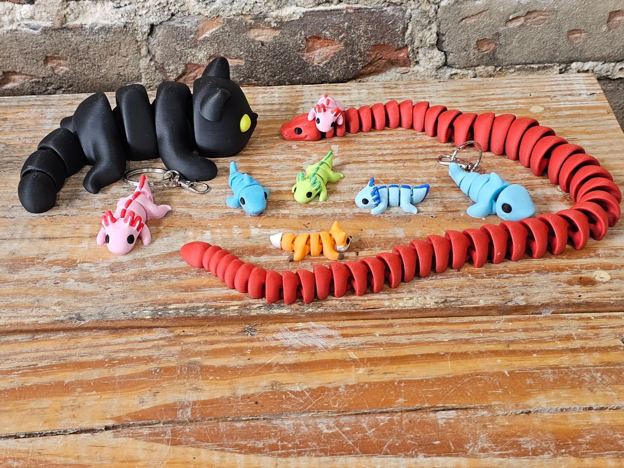 Mystery Box: 3D Printed Fidget Toys, Dragons, Axolotls, & Snakes. Limited Time Offer! Shop Main Street Collective Today!