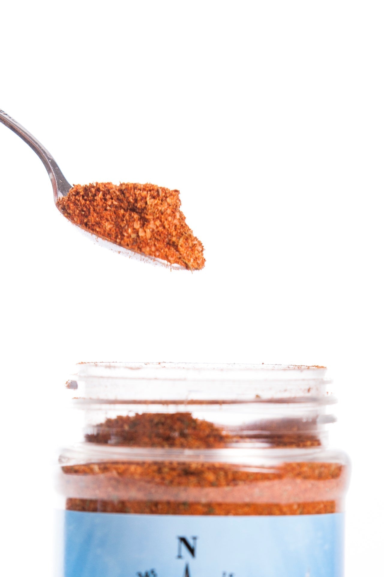Blackened Seasoning Blend: Spoon of Spice Above Jar