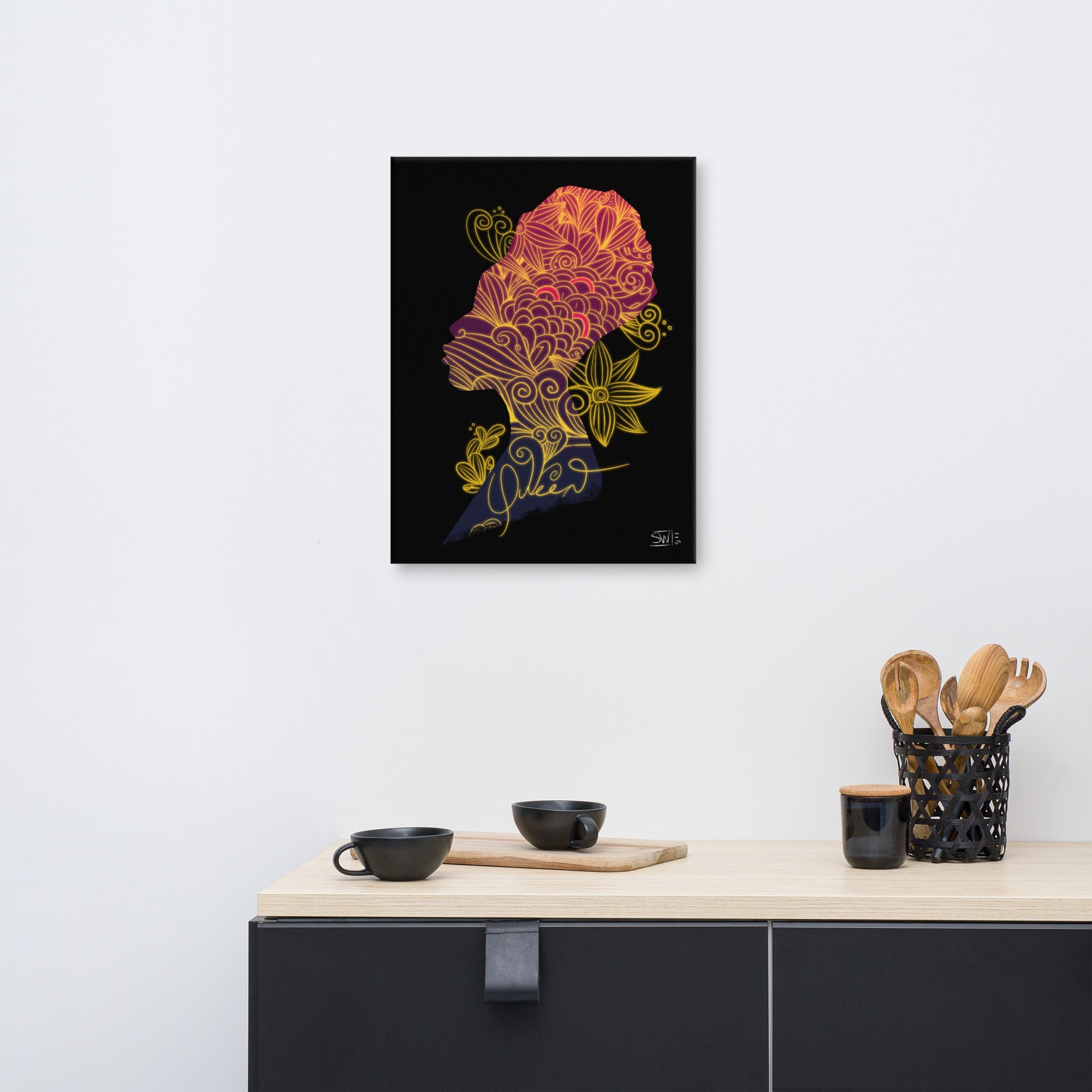 Queen Canvas Print: Silhouette of African American woman with floral designs. Black background, vibrant colors, home decor art.