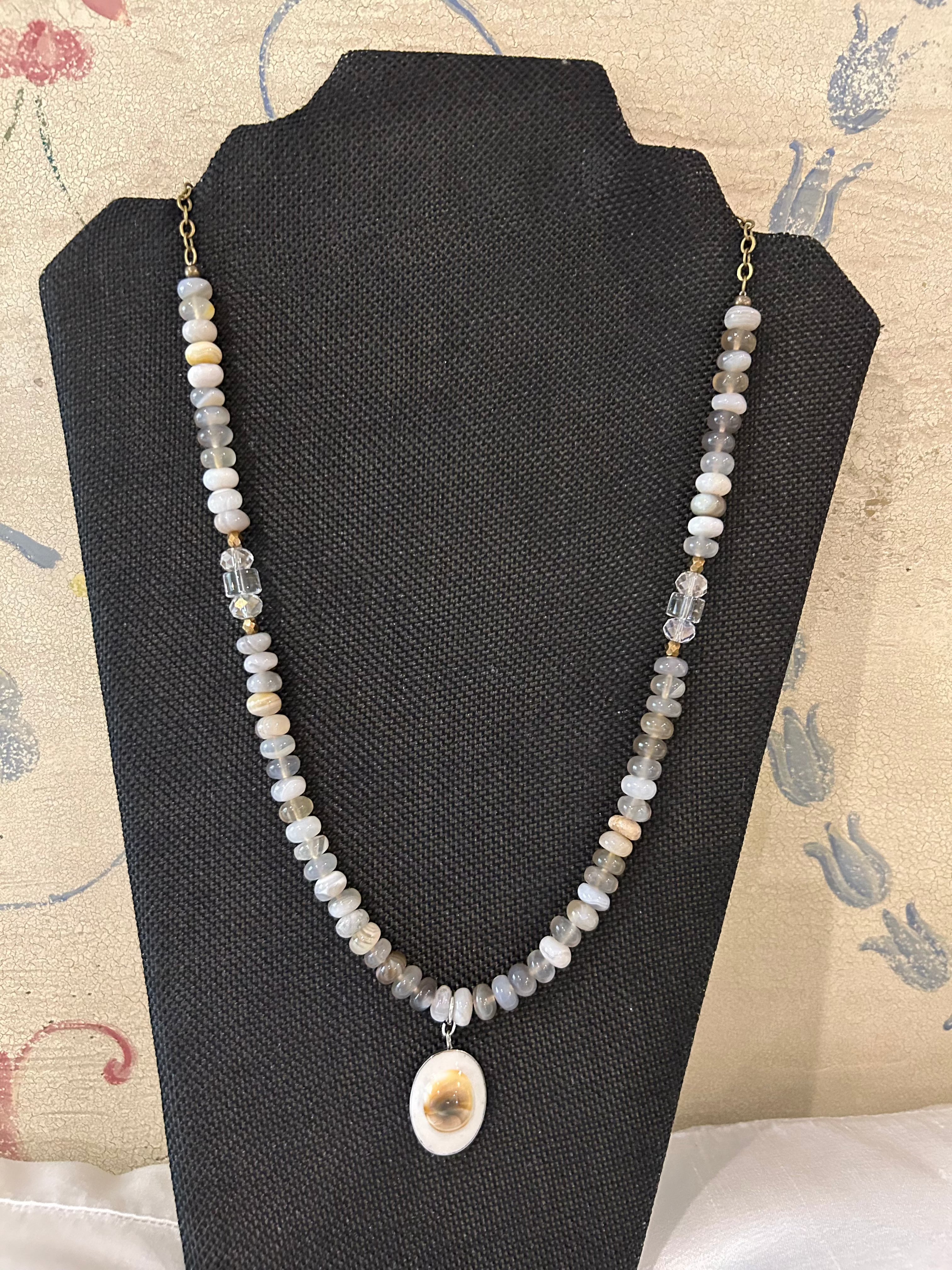 Soulful Designs 22" beaded necklace with Gray Agate bead and Lampwork glass, crystals, and Antique gold accents with shell pendant
