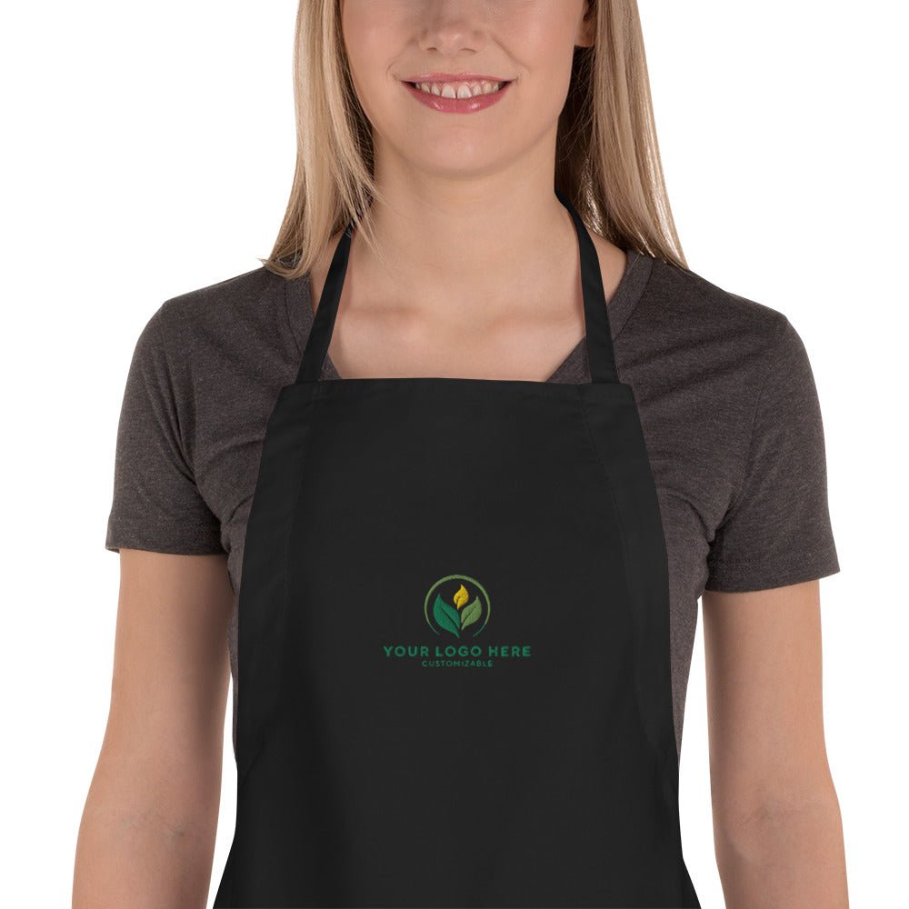 Customizable Black Embroidered Apron. Add Your Logo for Cooking, Crafting, or Business. Polyester-Cotton Blend with Pockets.
