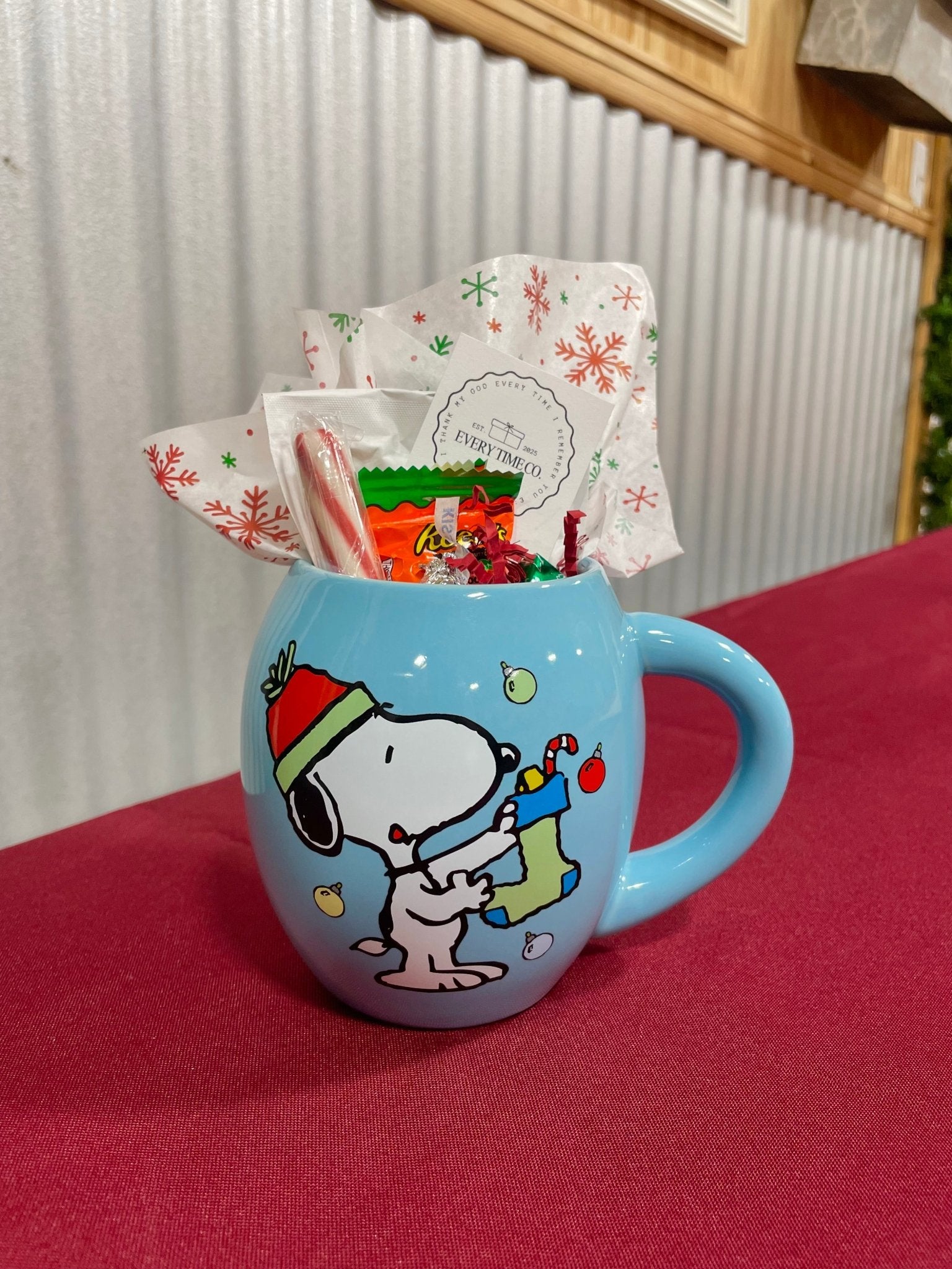Snoopy Christmas mug gift basket by Main Street Collective filled with holiday treats!