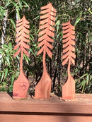 Front view of tall handcrafted cedar tree made from storm-damaged wood – Grayson Unlimited