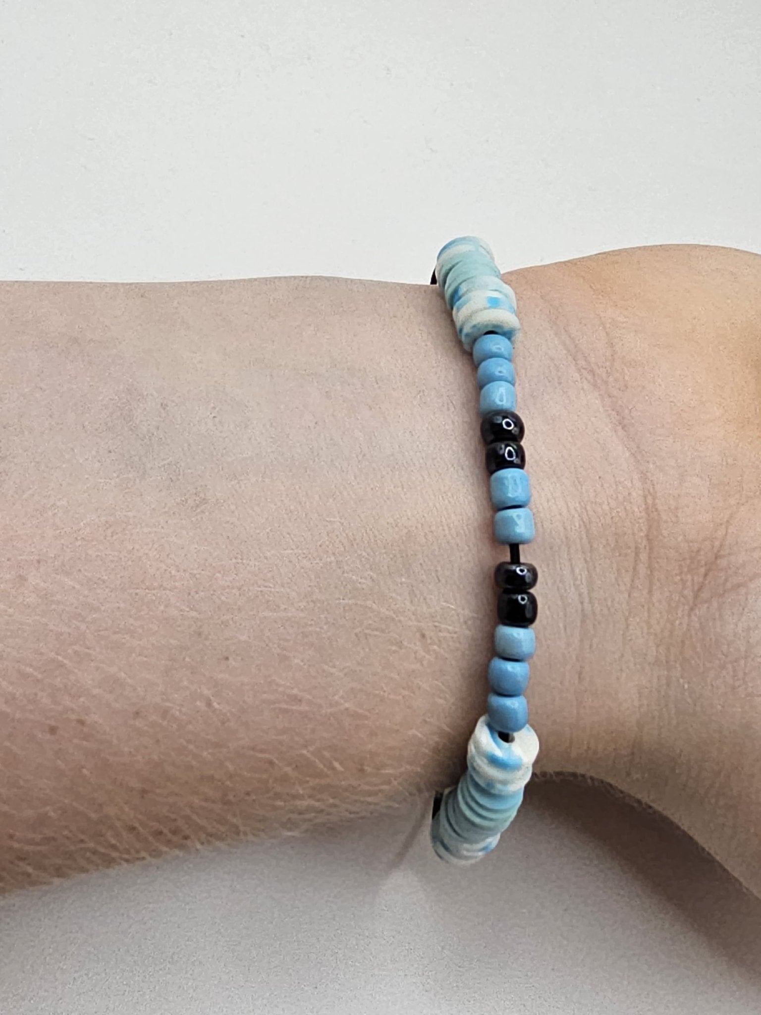 Ocean Chill Bracelet: Blue, Black, & Aqua Disc Beads. Handmade by Nora (11) @ Main Street Collective.