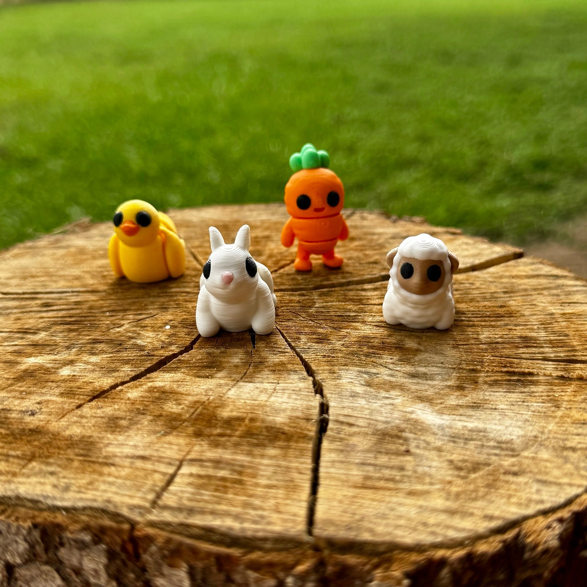 Easter Fidget Toys: Chick, Bunny, Carrot, Sheep on Wooden Stump. 3D Printed Miniatures from Main Street Collective.
