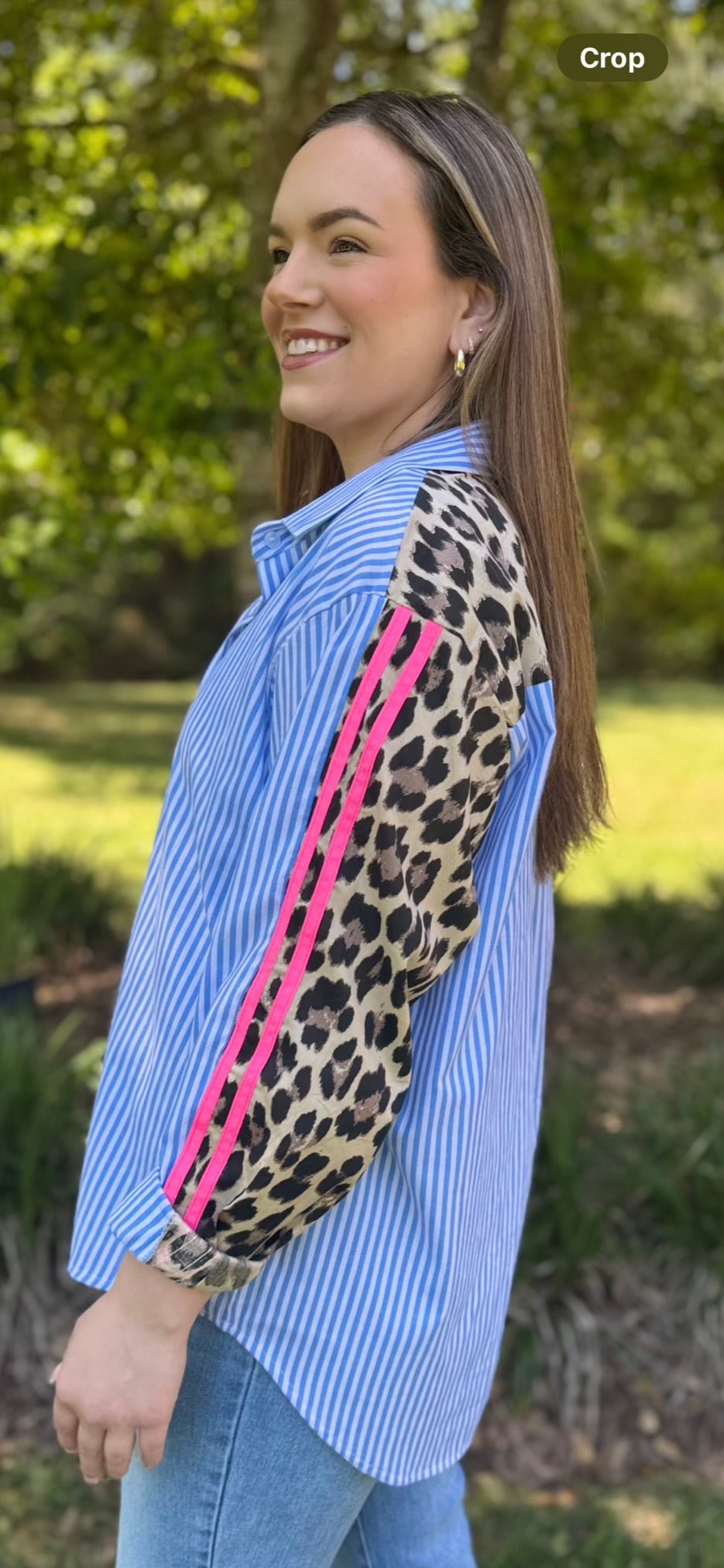 Striped button-down shirt with leopard print sleeve & pink stripe detail. Trendy Italian top for women.