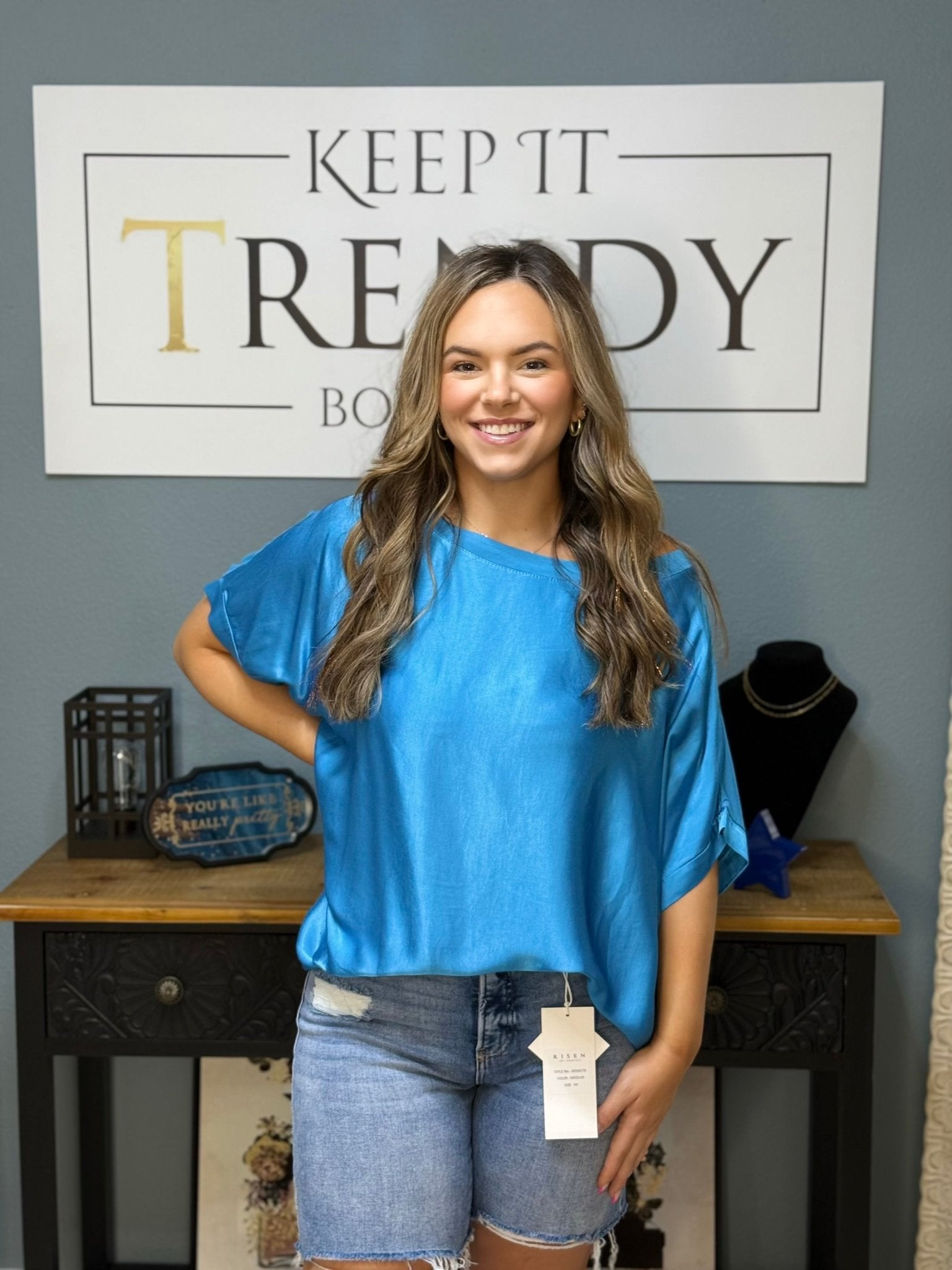 Italian Ocean Blue Satin Top at Main Street Collective L.L.C: Trendy Women's Boutique Clothing in Mississippi