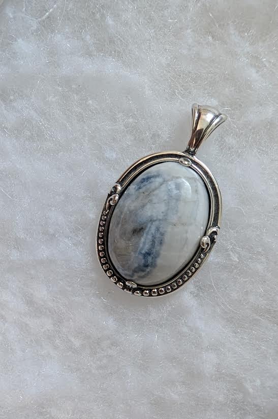 Lapis Lace Onyx Pendant: Sterling silver oval pendant with coastal blue gemstone, unique jewelry gift idea.