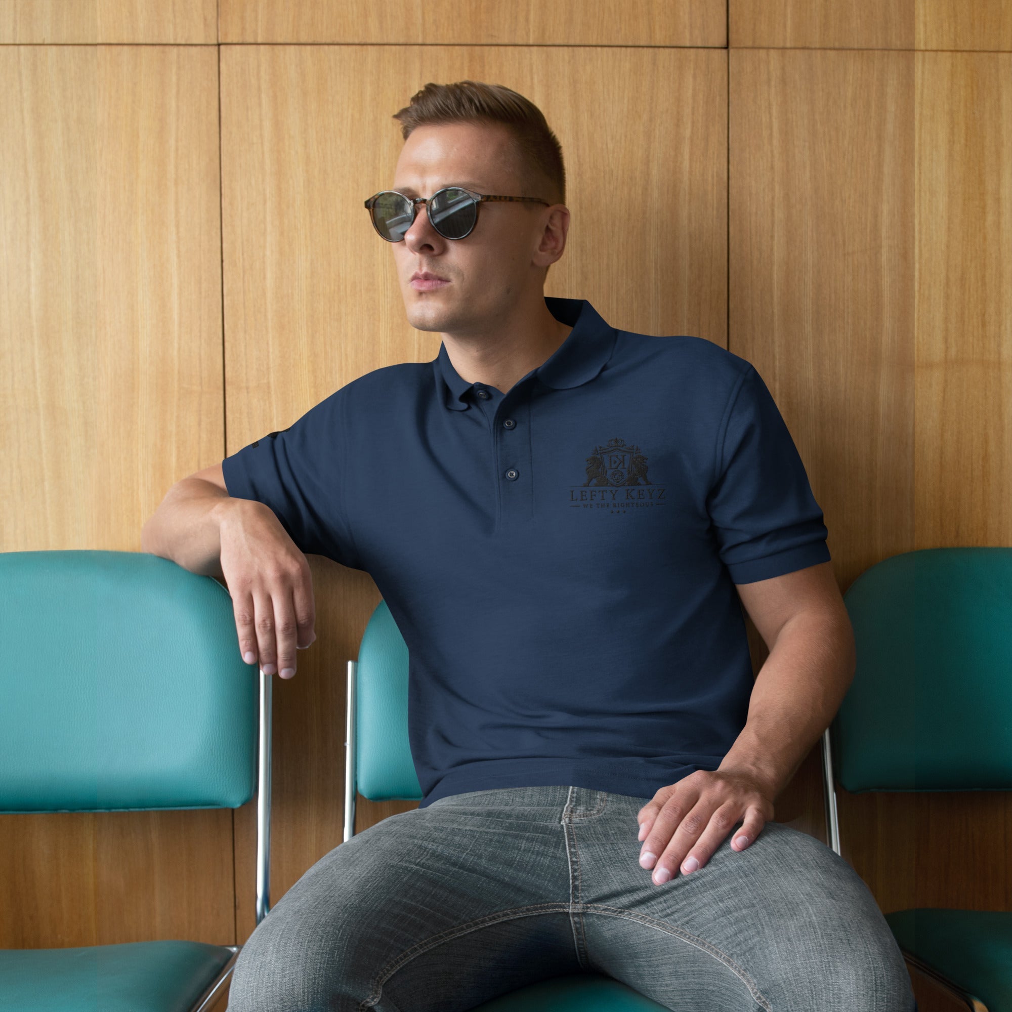 Man in Navy Leftykeyz Premium Polo Shirt - Stylish Men's Fashion