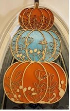 Hand-painted wooden pumpkin door hanger, fall decor by Main Street Collective