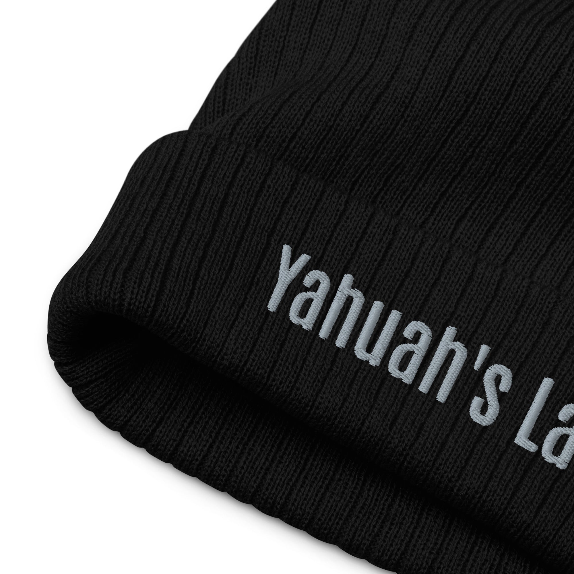 Black beanie with "Yahuah's Law In My Mind" embroidery. Ribbed knit cap.