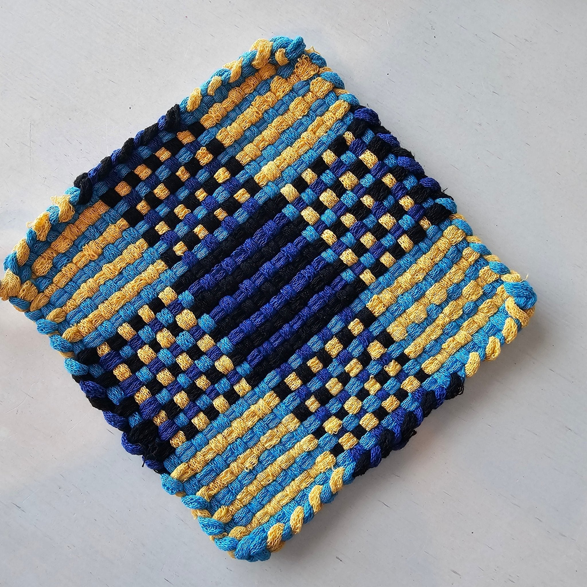 Handmade Woven Potholder: Blue, Yellow, & Black Cotton Hot Pad with Geometric Pattern