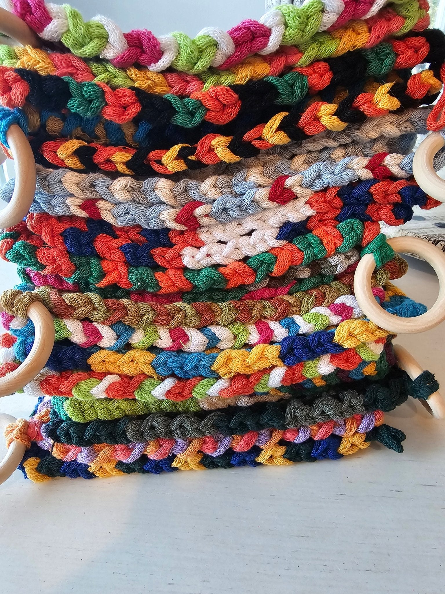 Handmade potholders by Penelope at Main Street Collective. Colorful woven kitchen accessory, heat resistant.