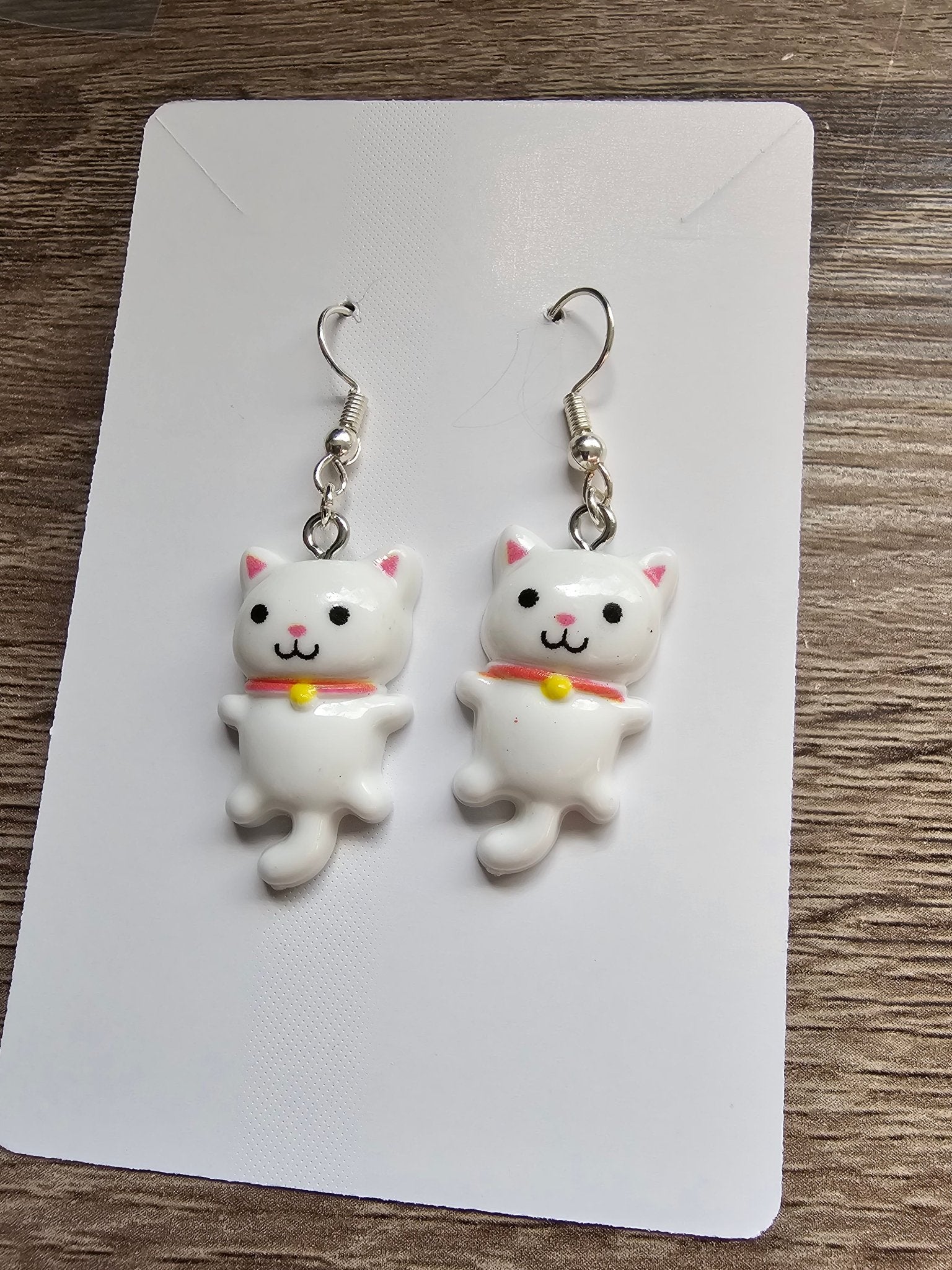 Kawaii kitty earrings: White cat dangle earrings with red collar, handmade by Main Street Collective - Cute cat lover jewelry