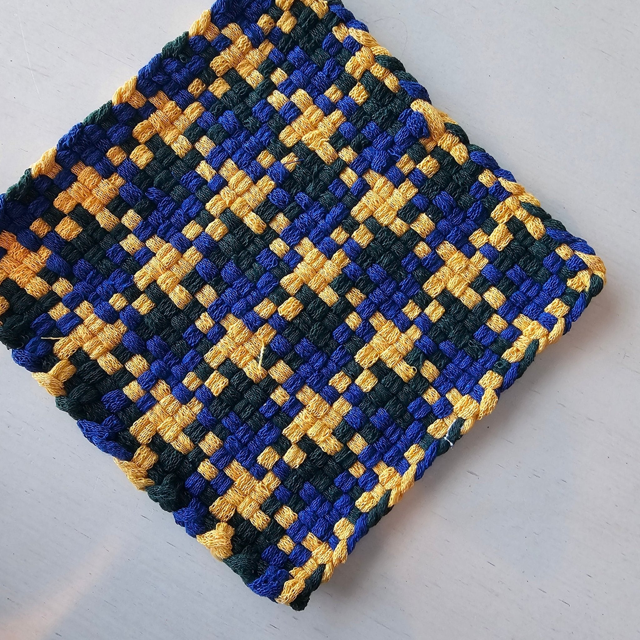 Handmade woven potholder - Penelope's Potholders blue, yellow, and green cotton looped from Main Street Collective