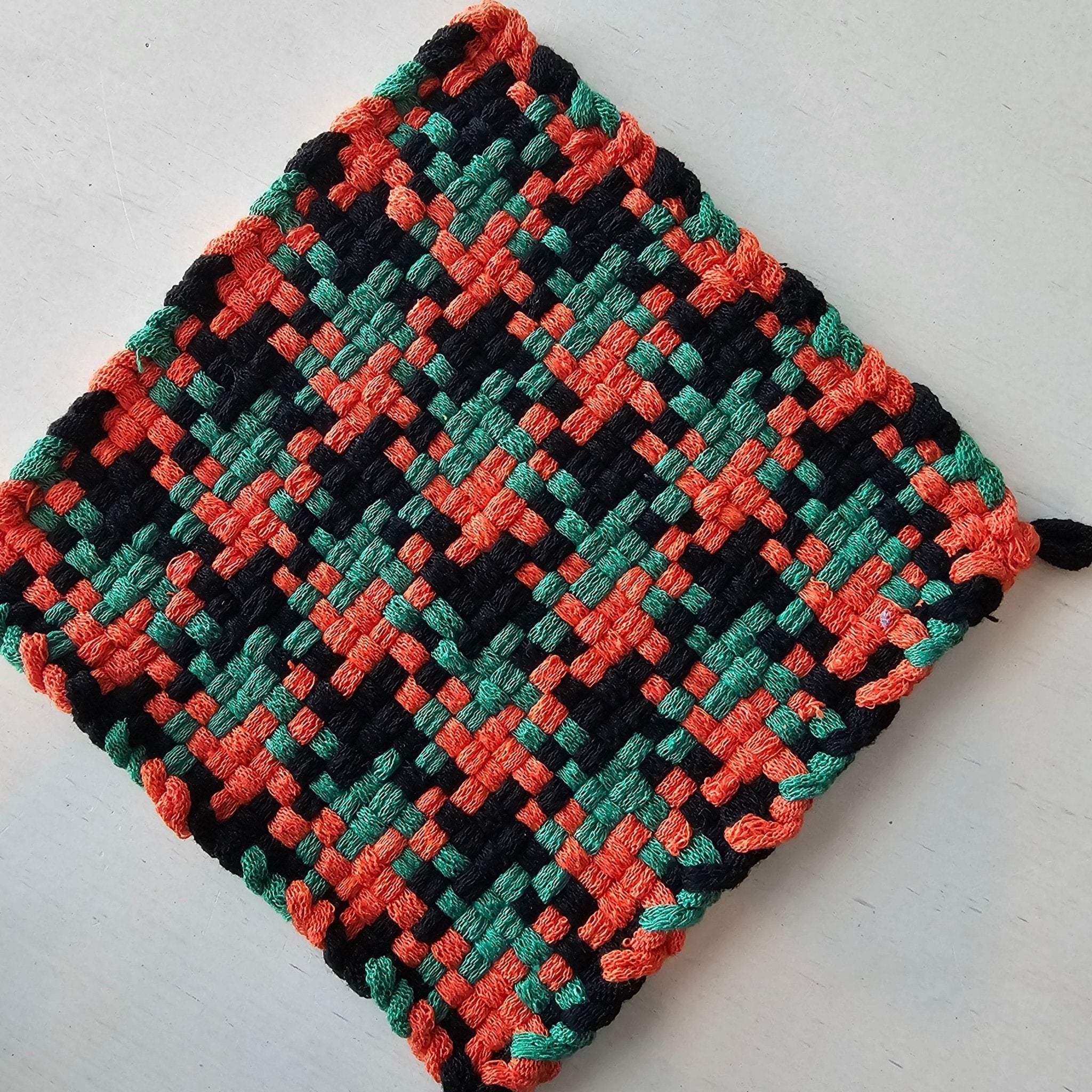 Handmade Woven Potholder: Black, Orange, and Green Cotton Kitchen Accessory