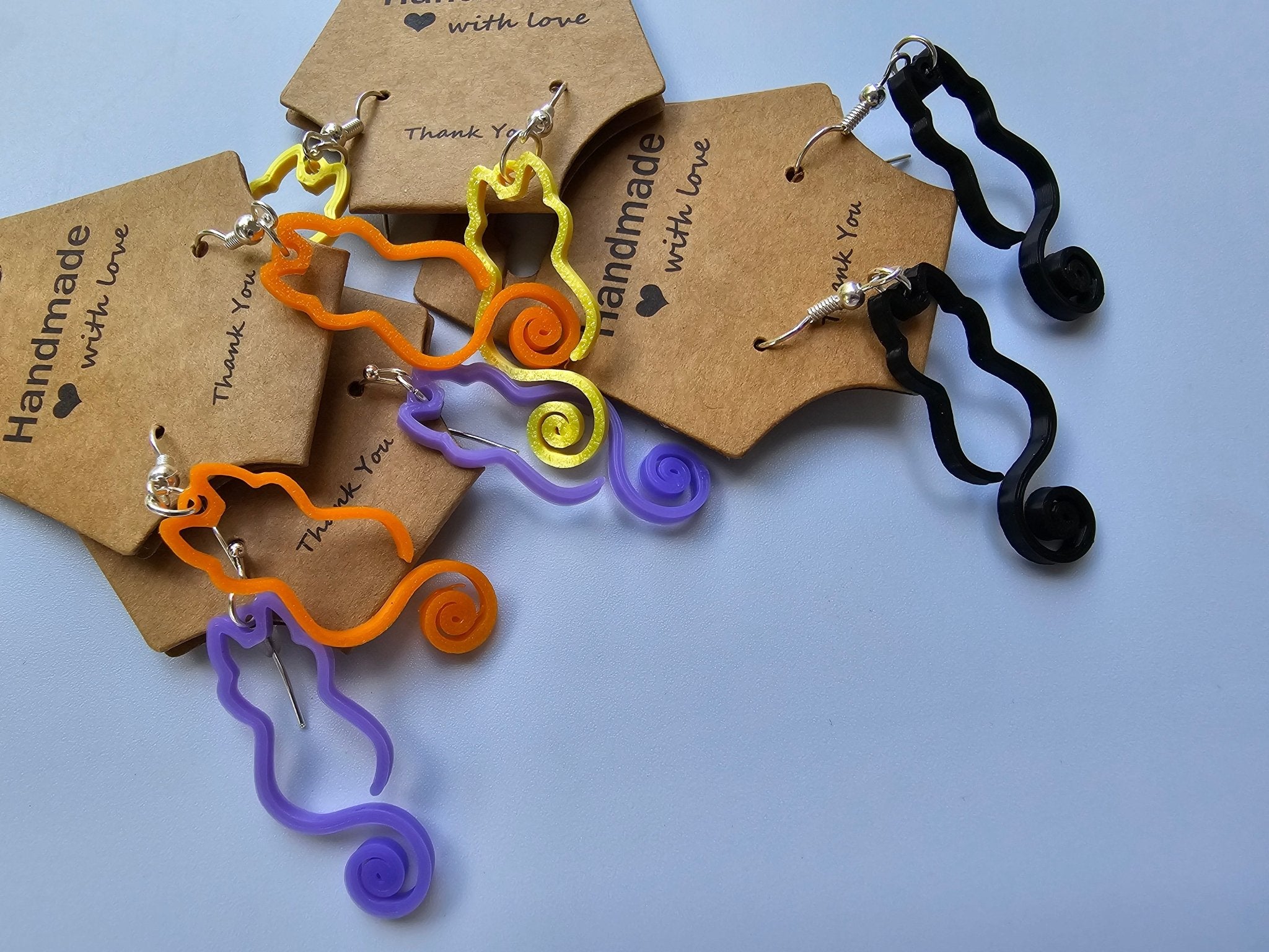 Curly Tail Cat Earrings: Handmade Black, Yellow, Orange, Purple 3D-Printed Cat Earrings. 