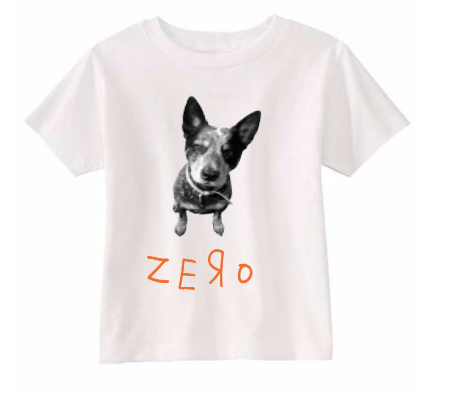Zero the Hero Dog T-Shirt for Youth - Main Street Collective white tee with black and white dog graphic and orange text.