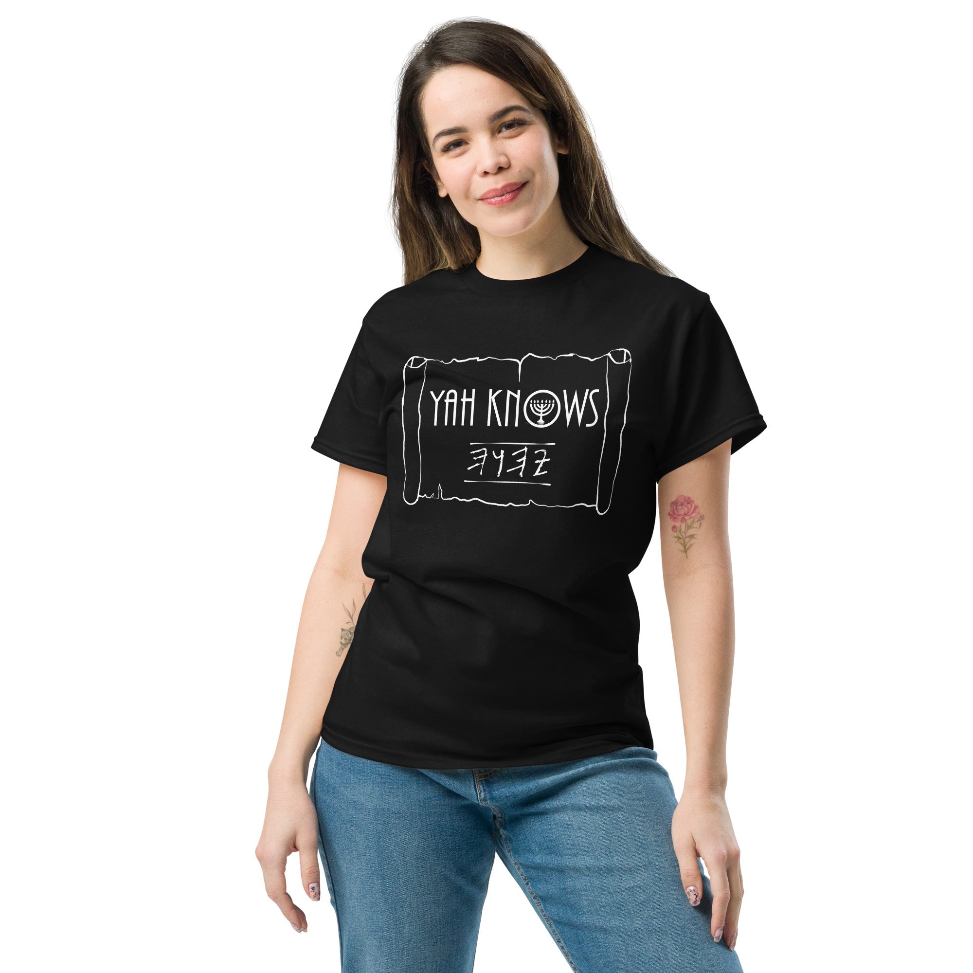 Woman wearing a black 'YAH KNOWS' LeftyKeyz t-shirt with Paleo Hebrew design.