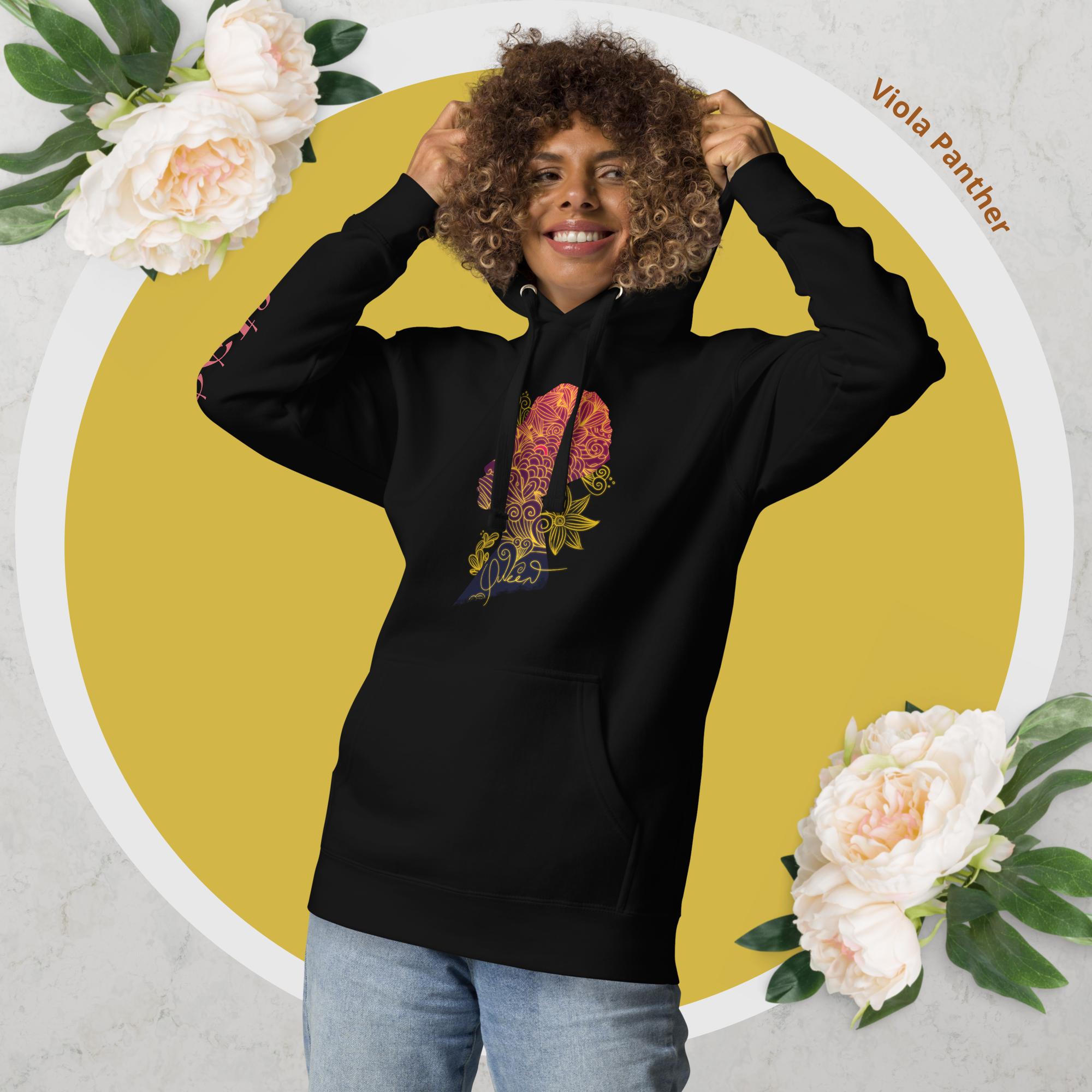 Viola Panther black Queen hoodie for women with floral design. Smiling model wearing black long-sleeve hoodie.